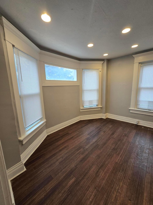 1035 Sullivant Ave, Columbus, OH 43223 - spare room with dark wood-style floors and recessed lighting