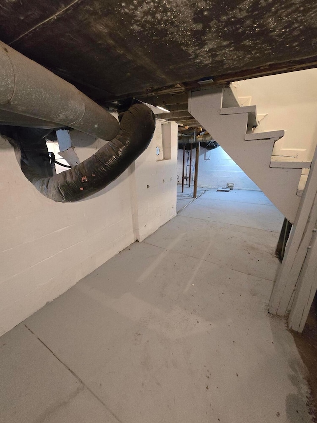 1035 Sullivant Ave, Columbus, OH 43223 - unfinished basement with stairway
