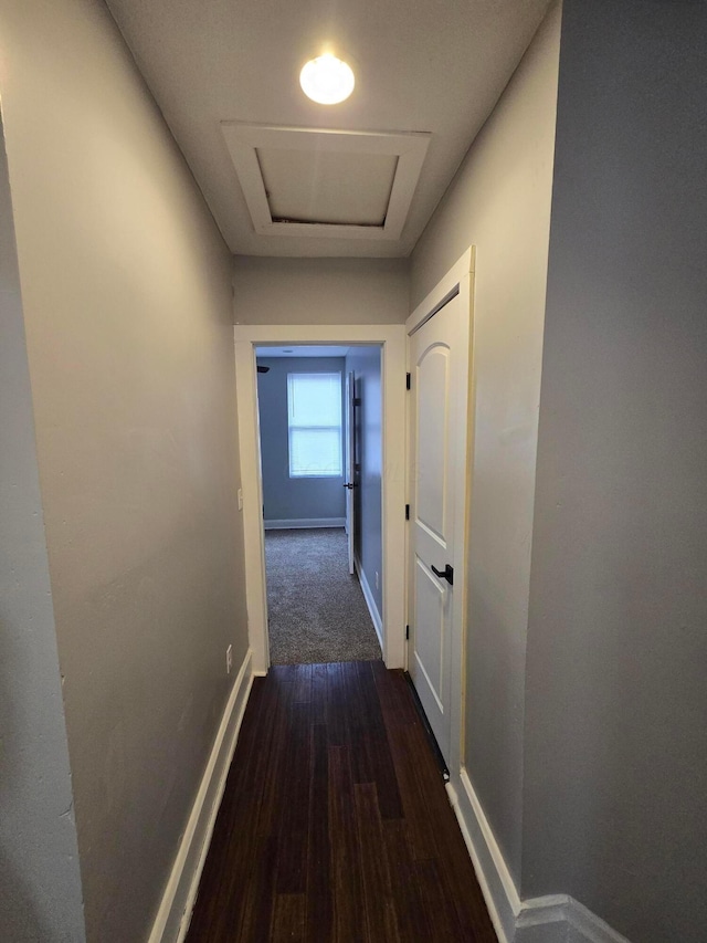 1035 Sullivant Ave, Columbus, OH 43223 - hallway with attic access and wood finished floors