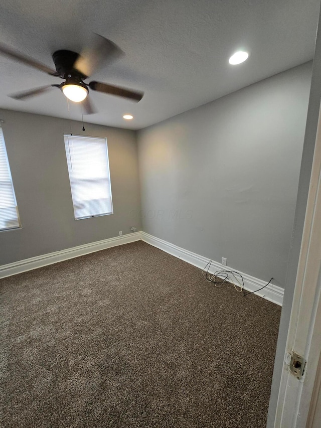 1035 Sullivant Ave, Columbus, OH 43223 - unfurnished room featuring dark colored carpet, ceiling fan, and recessed lighting