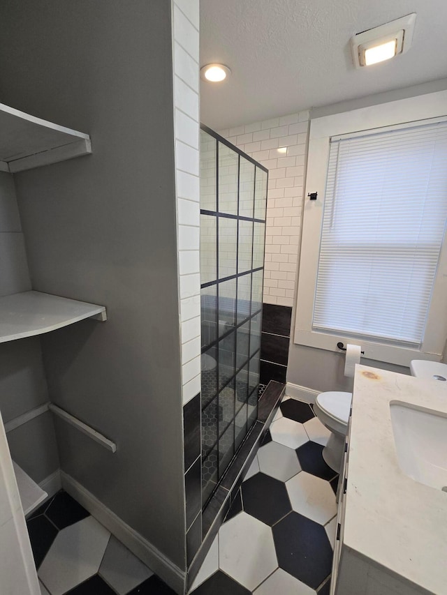 1035 Sullivant Ave, Columbus, OH 43223 - bathroom featuring a walk in shower, vanity, recessed lighting, and a textured ceiling