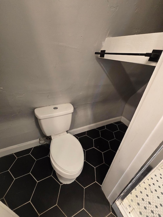1035 Sullivant Ave, Columbus, OH 43223 - bathroom with baseboards and tile patterned floors