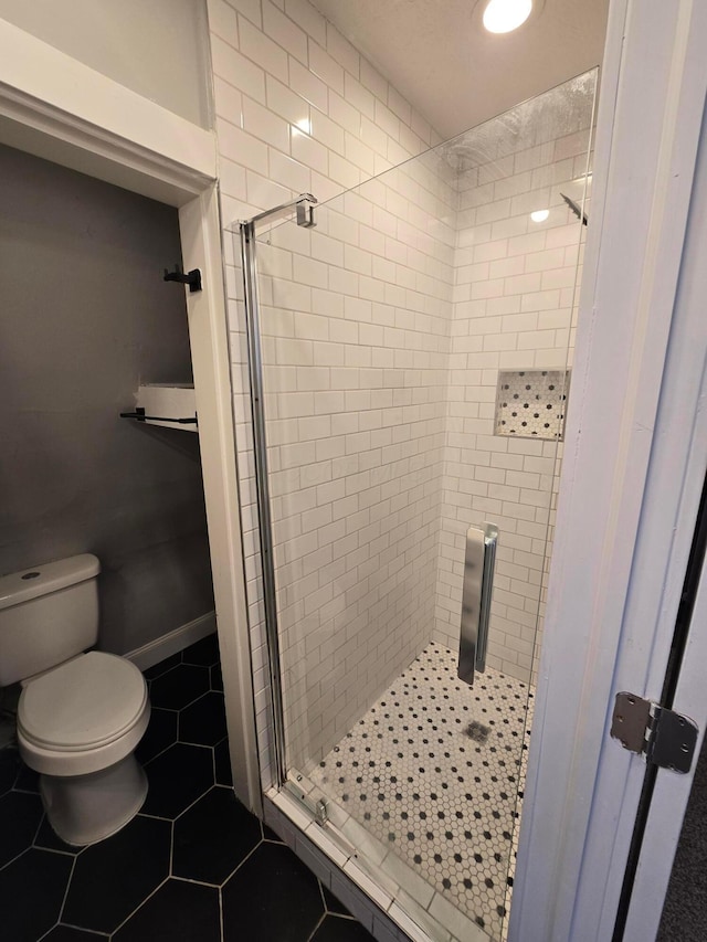 1035 Sullivant Ave, Columbus, OH 43223 - bathroom with a shower stall and tile patterned flooring
