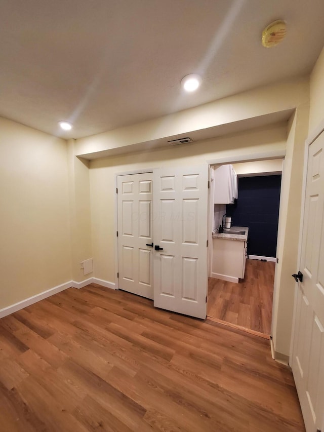 345 Dakota Ave, Columbus, OH 43223 - basement featuring light wood-style floors and recessed lighting
