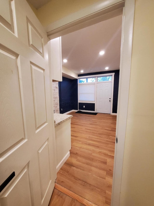 345 Dakota Ave, Columbus, OH 43223 - corridor with light wood-style floors and recessed lighting