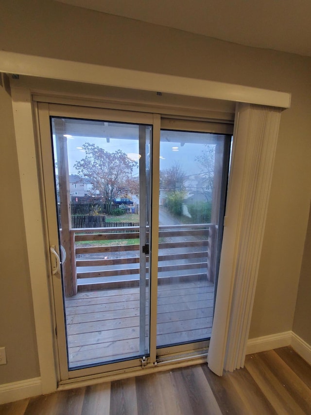 345 Dakota Ave, Columbus, OH 43223 - doorway featuring wood finished floors and baseboards