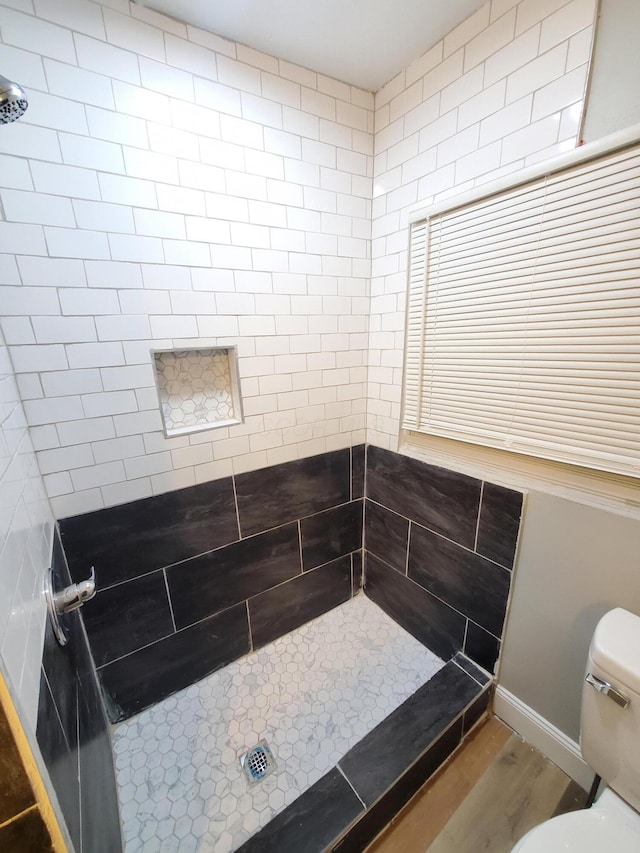 345 Dakota Ave, Columbus, OH 43223 - full bath featuring tiled shower and wood finished floors