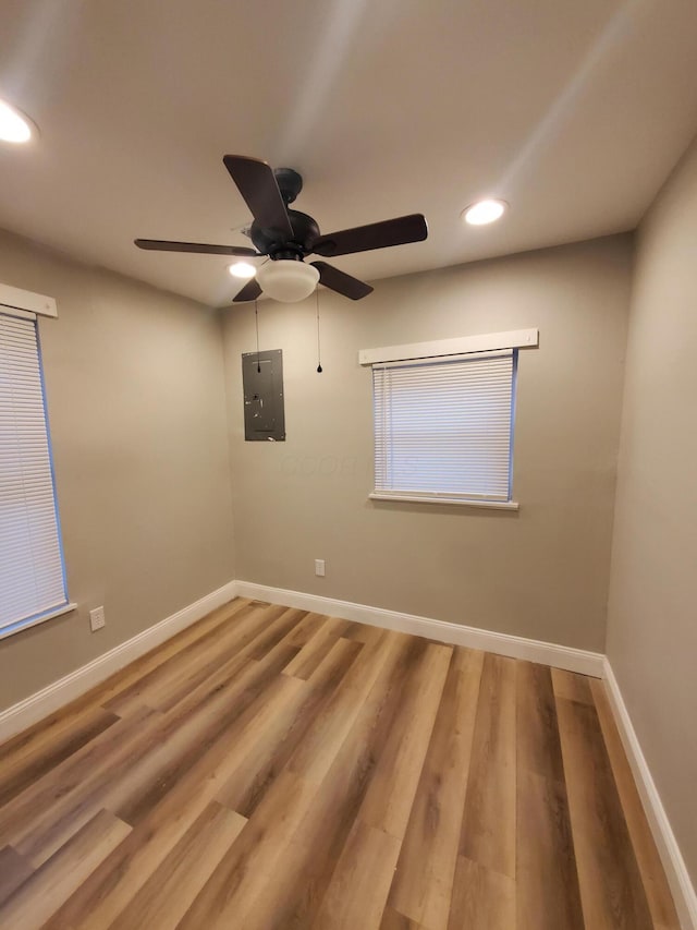 345 Dakota Ave, Columbus, OH 43223 - empty room with electric panel, ceiling fan, recessed lighting, and wood finished floors