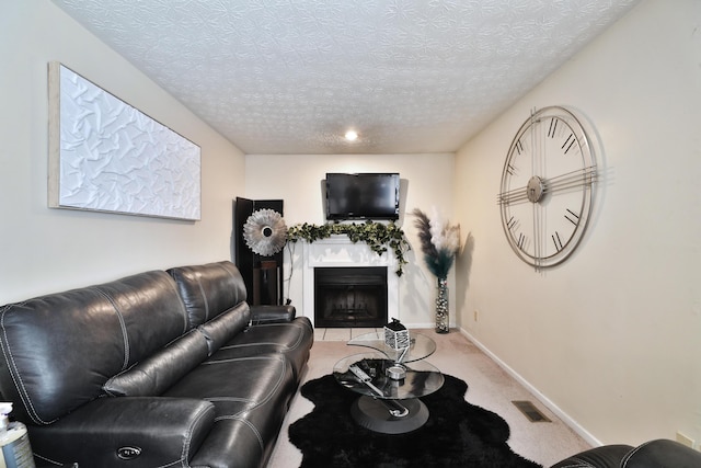 2214-2216 Pine Tree Ln, Reynoldsburg, OH 43068 - living room featuring a fireplace, light colored carpet, and a textured ceiling