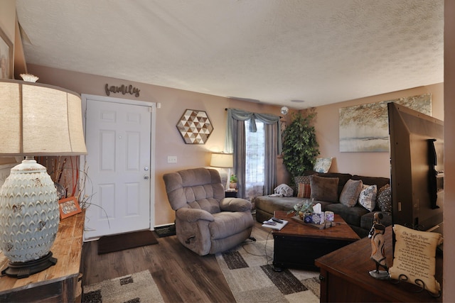 2214-2216 Pine Tree Ln, Reynoldsburg, OH 43068 - living area featuring wood finished floors and a textured ceiling