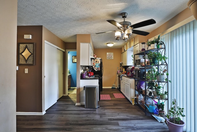 2214-2216 Pine Tree Ln, Reynoldsburg, OH 43068 - kitchen featuring ceiling fan, dark wood-style flooring, white cabinetry, a textured ceiling, and freestanding refrigerator