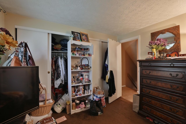 2214-2216 Pine Tree Ln, Reynoldsburg, OH 43068 - carpeted bedroom with a textured ceiling and multiple closets