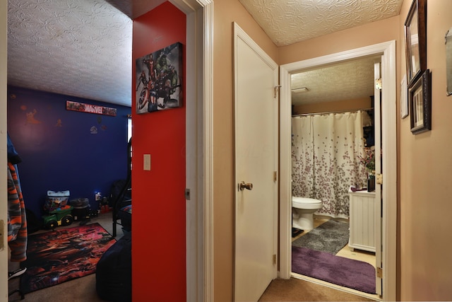 2214-2216 Pine Tree Ln, Reynoldsburg, OH 43068 - hall with carpet and a textured ceiling