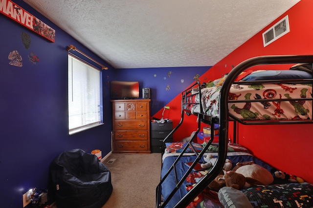 2214-2216 Pine Tree Ln, Reynoldsburg, OH 43068 - carpeted bedroom featuring a textured ceiling