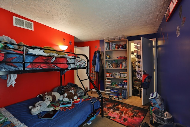 2214-2216 Pine Tree Ln, Reynoldsburg, OH 43068 - bedroom featuring carpet flooring and a textured ceiling