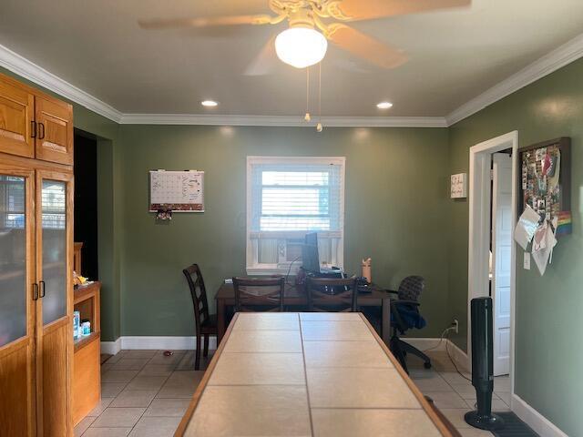 427 John St, Newark, OH 43055 - dining room featuring light tile patterned flooring, a ceiling fan, ornamental molding, and recessed lighting