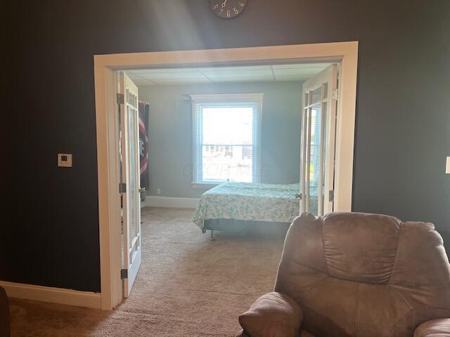 427 John St, Newark, OH 43055 - carpeted bedroom featuring baseboards