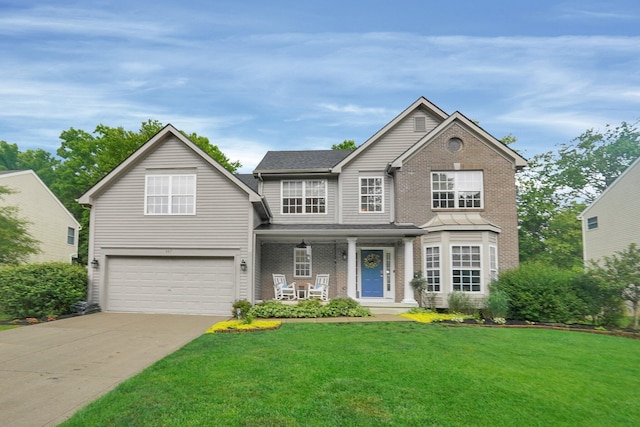307 Timberland View Dr, Newark, OH 43055 - traditional-style house featuring a porch, a garage, a front lawn, concrete driveway, and brick siding