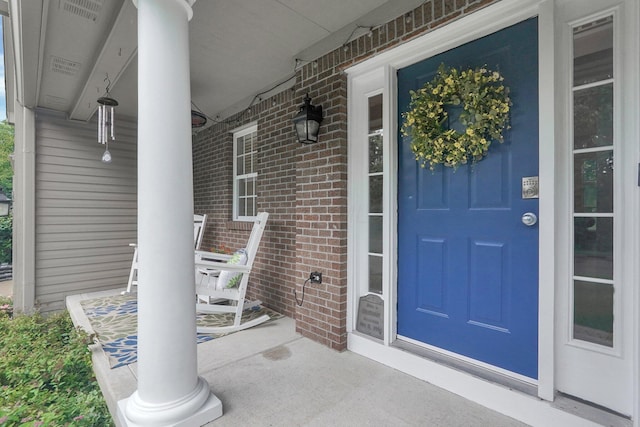 307 Timberland View Dr, Newark, OH 43055 - property entrance featuring a porch and brick siding