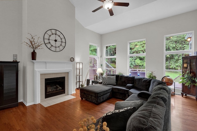 307 Timberland View Dr, Newark, OH 43055 - living area with a ceiling fan, hardwood / wood-style flooring, high vaulted ceiling, and a tile fireplace