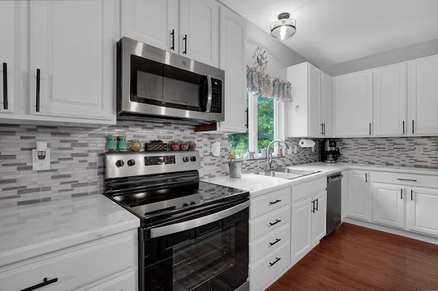 307 Timberland View Dr, Newark, OH 43055 - kitchen with stainless steel appliances, light countertops, white cabinets, and tasteful backsplash