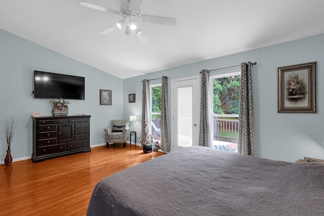 307 Timberland View Dr, Newark, OH 43055 - bedroom featuring access to exterior, wood finished floors, lofted ceiling, and ceiling fan
