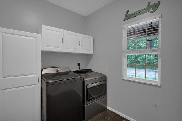 307 Timberland View Dr, Newark, OH 43055 - laundry area with independent washer and dryer, cabinet space, and dark tile patterned flooring