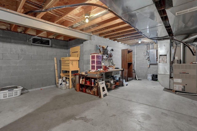 307 Timberland View Dr, Newark, OH 43055 - unfinished below grade area featuring electric panel, concrete block wall, and heating unit
