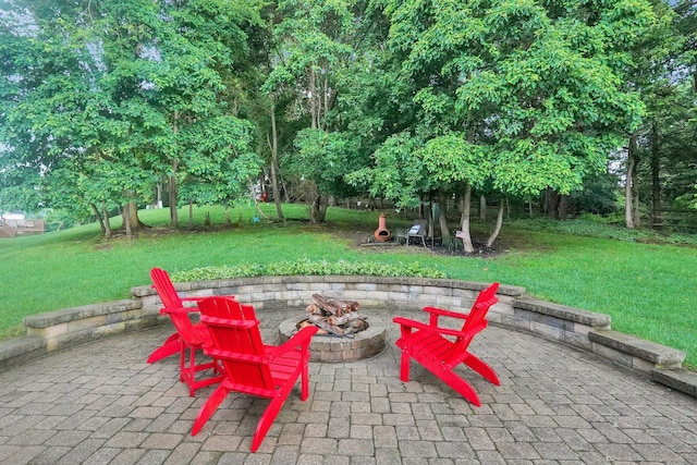 307 Timberland View Dr, Newark, OH 43055 - view of patio with an outdoor fire pit