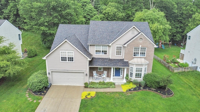 307 Timberland View Dr, Newark, OH 43055 - traditional home featuring an attached garage, driveway, a shingled roof, a porch, and brick siding