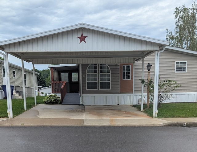 22 Birch Row Dr, Delaware, OH 43015 - view of front of home with a carport and a front lawn