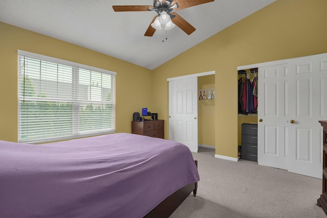 2184 Victoria Park Dr, Columbus, OH 43235 - bedroom featuring vaulted ceiling, light colored carpet, multiple closets, and ceiling fan