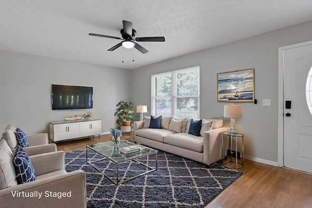 1615 Coronet Dr, Columbus, OH 43224 - living room with wood finished floors and a ceiling fan