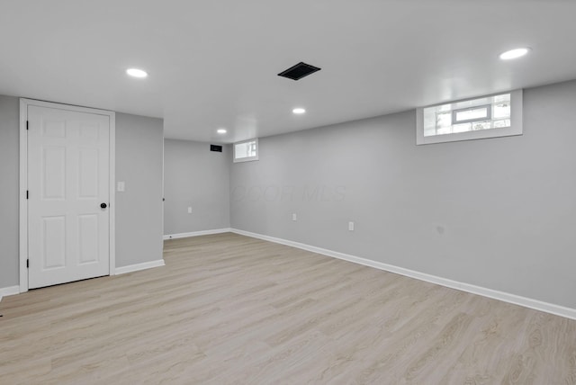 1615 Coronet Dr, Columbus, OH 43224 - below grade area with light wood-style floors and recessed lighting