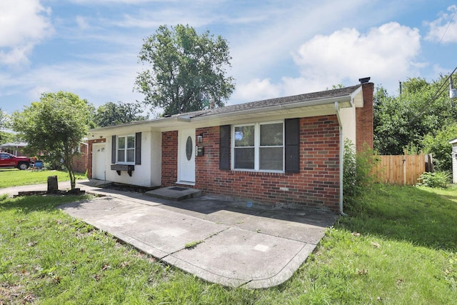 1615 Coronet Dr, Columbus, OH 43224 - view of front of house with brick siding and a chimney