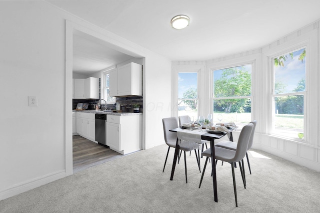 634 Columbus Ave Unit 1, Washington Court House, OH 43160 - dining space with light carpet and healthy amount of natural light