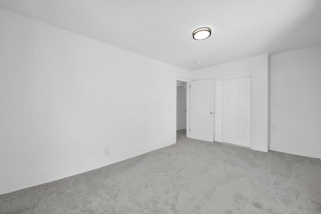 634 Columbus Ave Unit 1, Washington Court House, OH 43160 - unfurnished bedroom featuring carpet floors and a closet