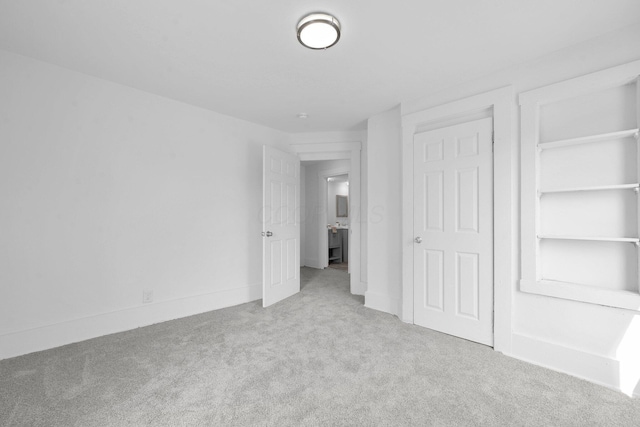634 Columbus Ave Unit 1, Washington Court House, OH 43160 - unfurnished bedroom featuring carpet floors