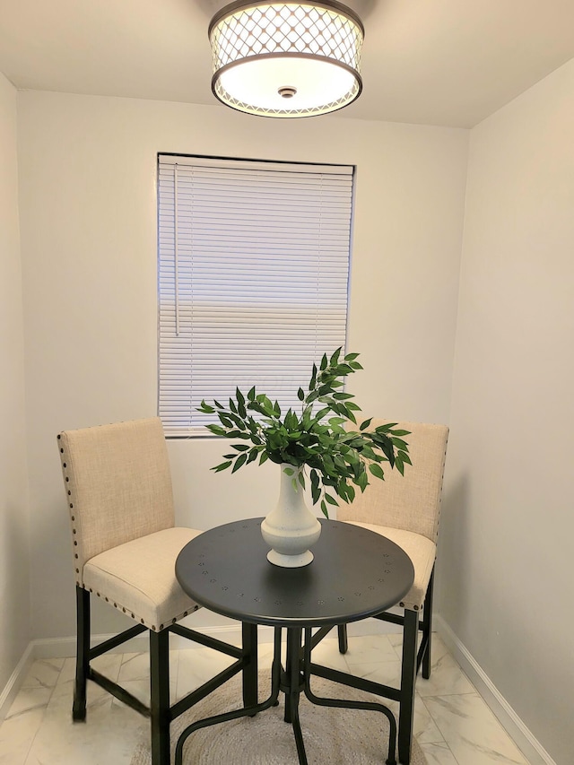 570 N Ohio Ave, Columbus, OH 43203 - sitting room with light marble finish flooring and baseboards