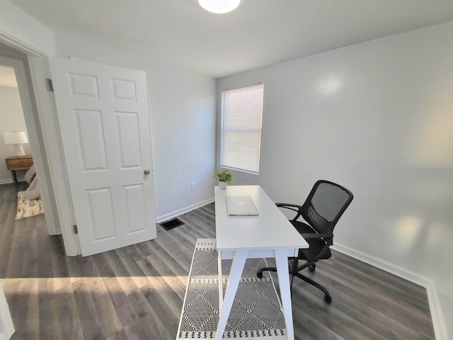 570 N Ohio Ave, Columbus, OH 43203 - office featuring baseboards and dark wood-style floors