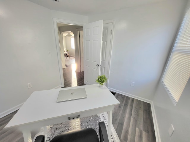 570 N Ohio Ave, Columbus, OH 43203 - office with arched walkways and dark wood-style floors