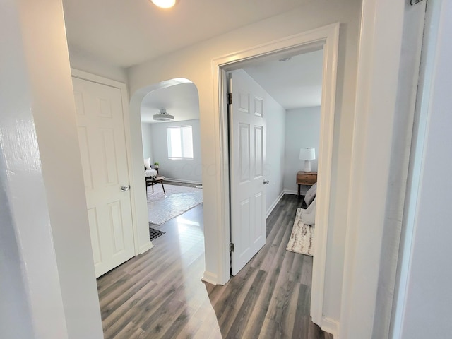 570 N Ohio Ave, Columbus, OH 43203 - corridor with arched walkways and dark wood finished floors