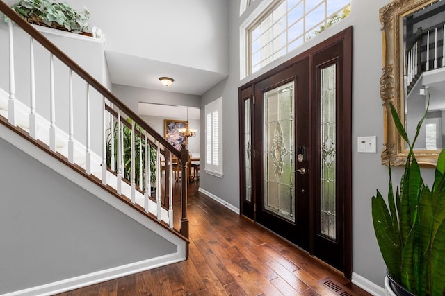 918 Dianthus Ct, Reynoldsburg, OH 43068 - foyer featuring stairs, hardwood / wood-style flooring, and a high ceiling