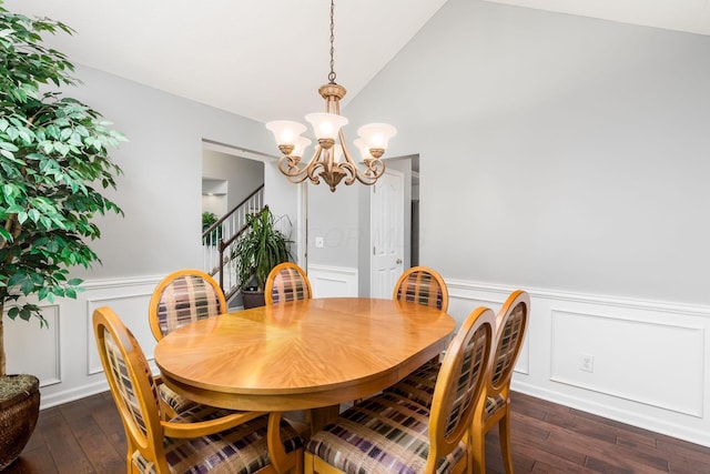 918 Dianthus Ct, Reynoldsburg, OH 43068 - dining room with a chandelier, dark wood-style floors, a wainscoted wall, a decorative wall, and stairs