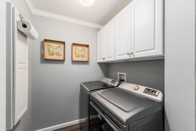 918 Dianthus Ct, Reynoldsburg, OH 43068 - washroom featuring independent washer and dryer, cabinet space, crown molding, and dark wood-style flooring