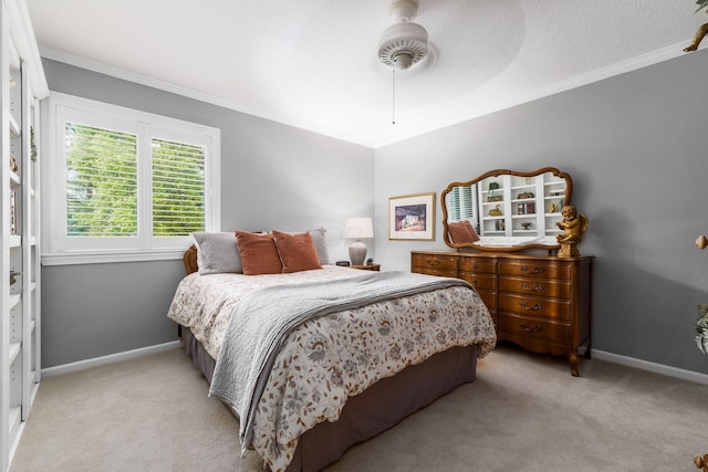 918 Dianthus Ct, Reynoldsburg, OH 43068 - bedroom featuring ornamental molding, light colored carpet, and ceiling fan