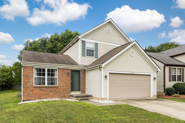 3299 Bellowind Dr, Reynoldsburg, OH 43068 - traditional-style house with a garage, driveway, brick siding, a front lawn, and a shingled roof