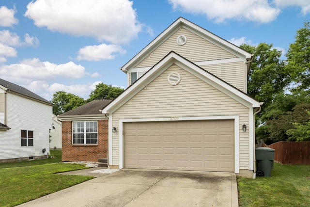 3299 Bellowind Dr, Reynoldsburg, OH 43068 - traditional-style house featuring driveway, a front yard, brick siding, and an attached garage