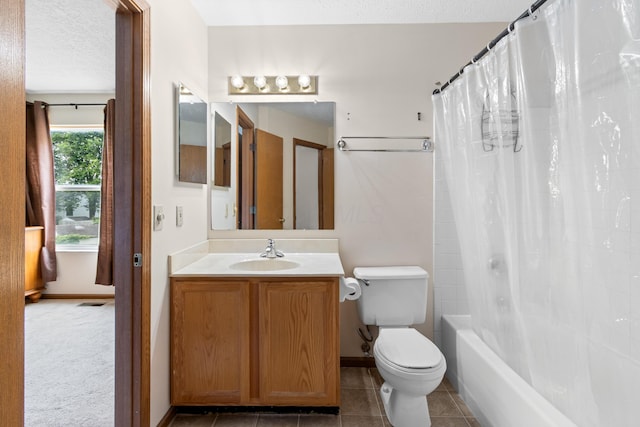 3299 Bellowind Dr, Reynoldsburg, OH 43068 - bathroom featuring vanity, shower / bathtub combination with curtain, tile patterned flooring, and a textured ceiling