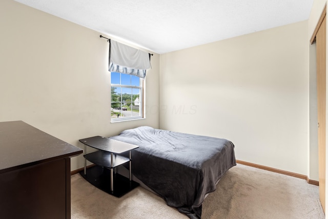 3299 Bellowind Dr, Reynoldsburg, OH 43068 - bedroom featuring light colored carpet and baseboards